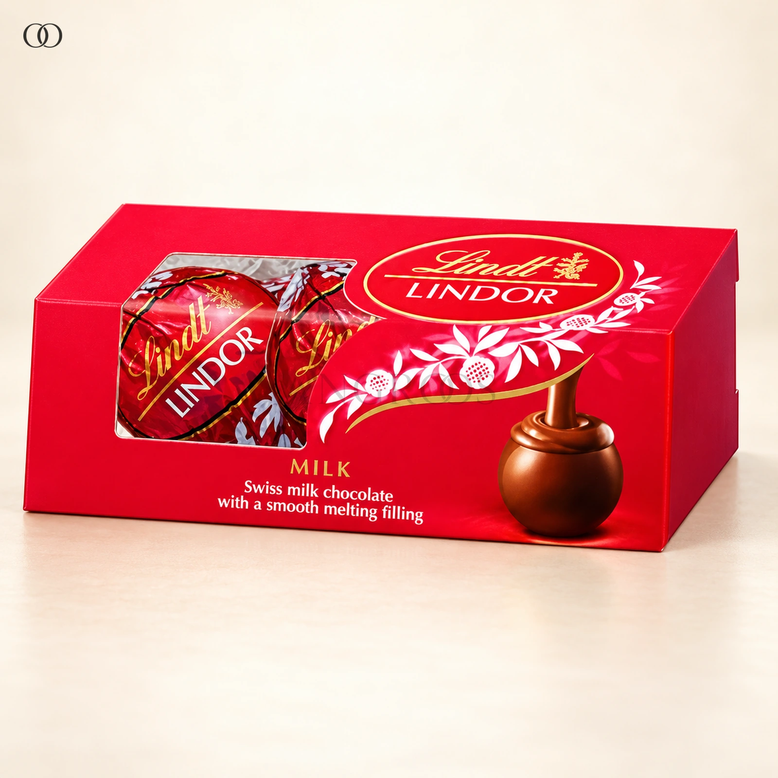 Front packaging of Lindt LINDOR Milk Chocolate Truffles Trio Gift Pack, 37.5 g