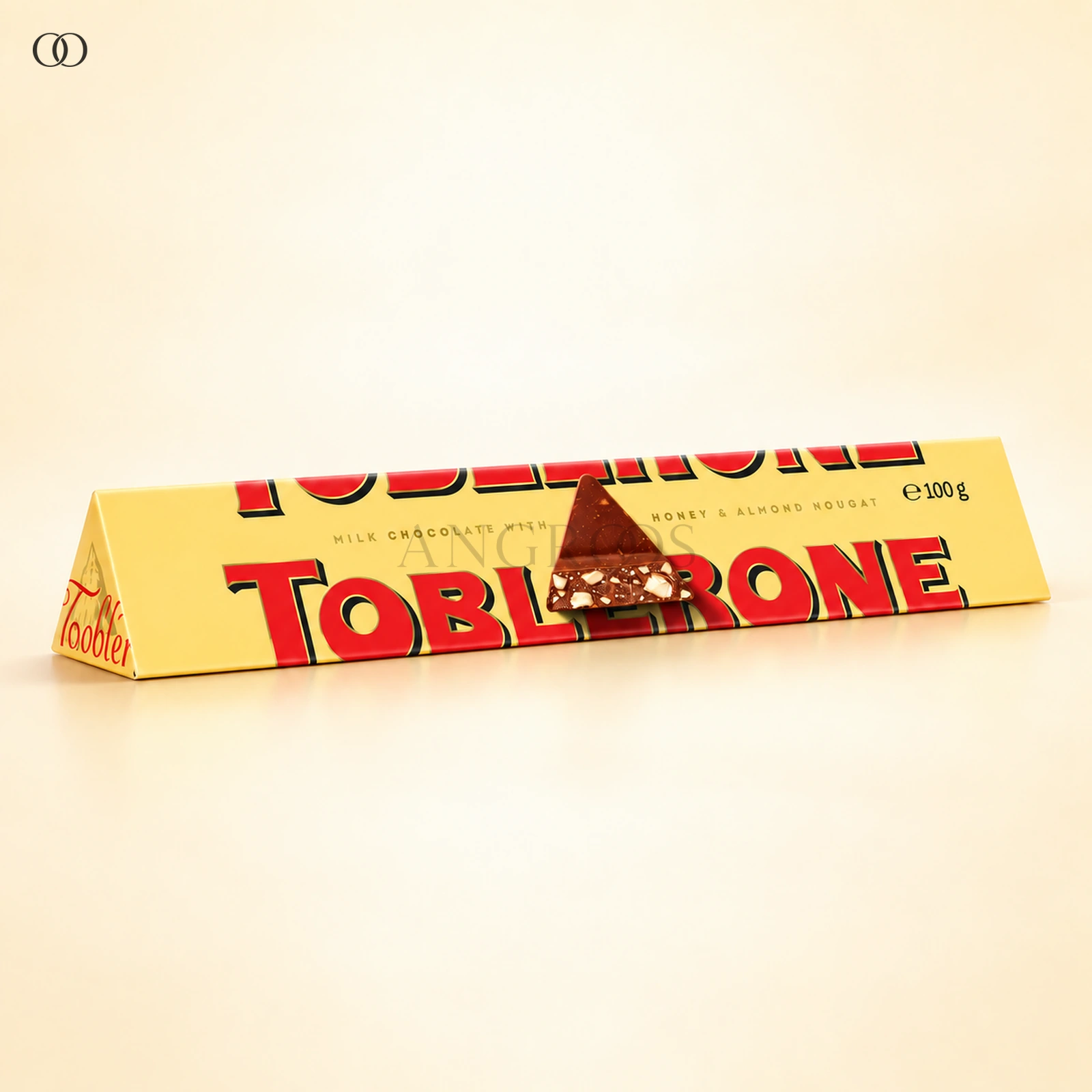 Front packaging of Toblerone Swiss Milk Chocolate with Honey & Almond Nougat, 100 g