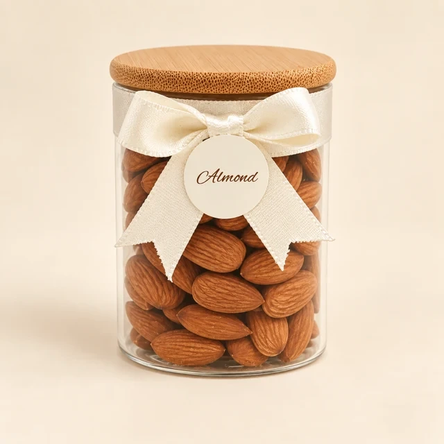 Almonds in a jar with wooden lid and cream ribbon — front view